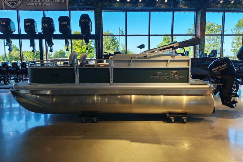 The Image of 2027 Sun Tracker Bass Buggy 16 XL Select pontoon boat in showroom. - 1