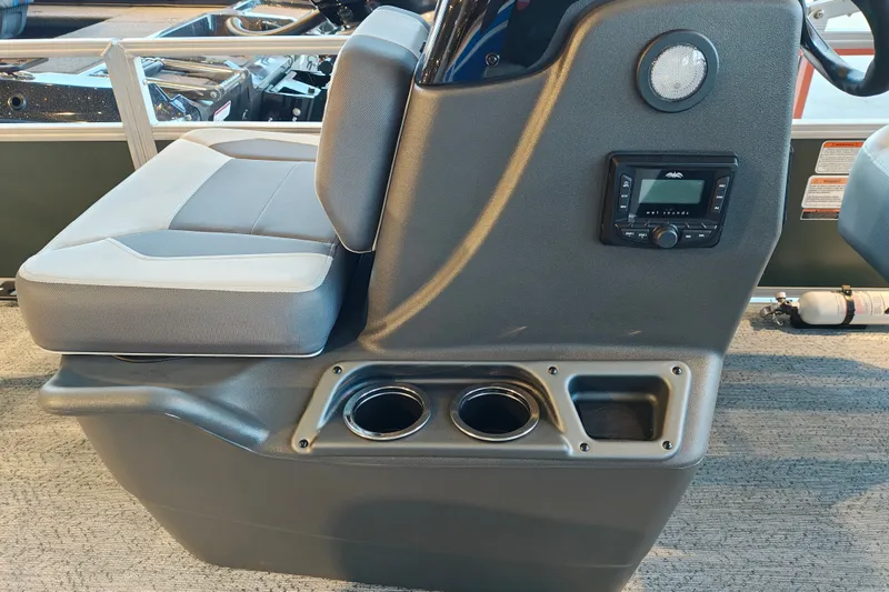 Slide: The Image of 2027 Sun Tracker Bass Buggy 16 XL Select boat seat with cup holders and control panel. - 15
