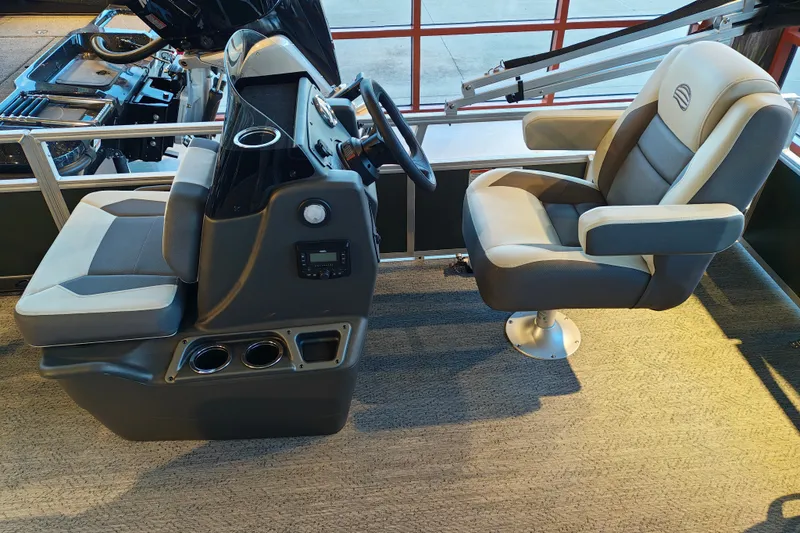 Slide: The Image of Interior of 2027 Sun Tracker Bass Buggy 16 XL Select pontoon boat with seating and console. - 14