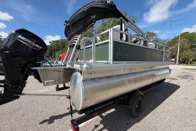 Slide: The Image of 2027 Sun Tracker Bass Buggy 16 XL Select pontoon boat with Mercury outboard motor. - 67