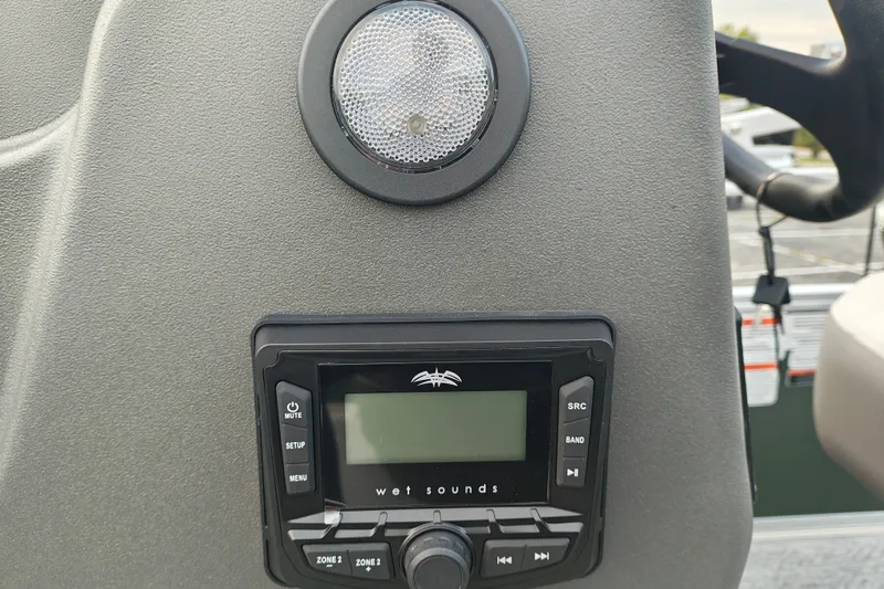 Slide: The Image of 2027 Sun Tracker Bass Buggy 18 DLX dashboard with Wet Sounds audio system. - 29