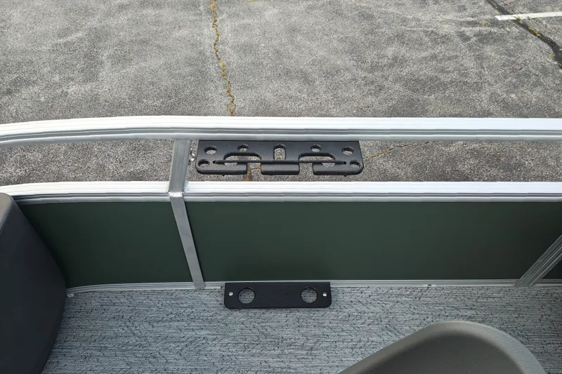 Slide: The Image of 2027 Sun Tracker Bass Buggy 18 DLX boat interior with railing and mounting bracket. - 34