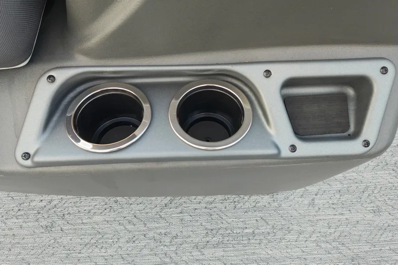 Slide: The Image of Cup holders and storage compartment on 2027 Sun Tracker Bass Buggy 18 DLX boat. - 28
