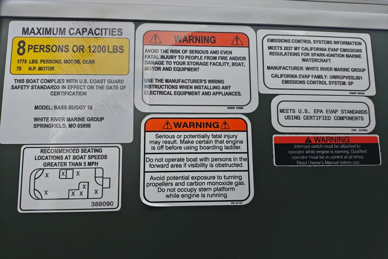 Slide: The Image of Safety and capacity labels on 2027 Sun Tracker Bass Buggy 18 DLX boat. - 26
