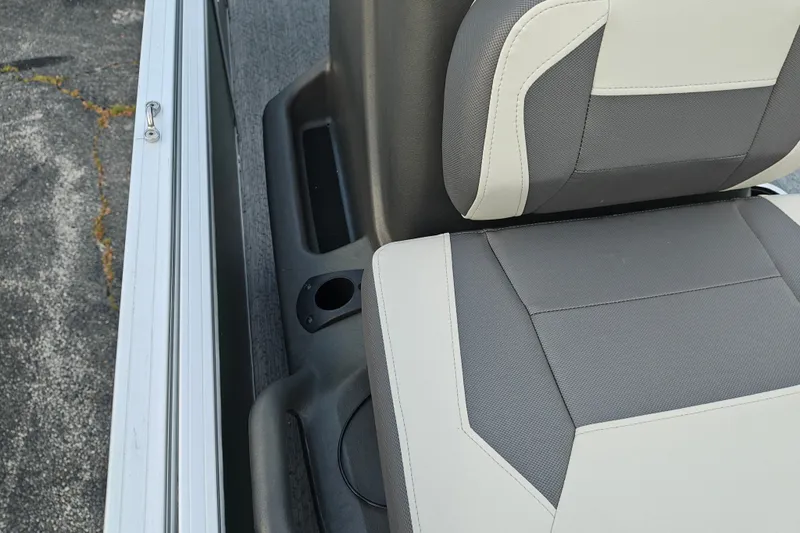 Slide: The Image of Sun Tracker Bass Buggy 18 DLX 2027 boat seat with cup holder detail. - 32