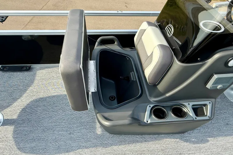 Slide: The Image of 2027 Sun Tracker Bass Buggy 18 DLX boat seat with storage compartment and cup holders. - 13