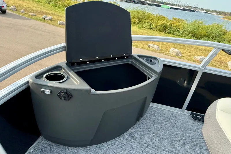 Slide: The Image of Open storage compartment on 2027 Sun Tracker Bass Buggy 18 DLX pontoon boat. - 15