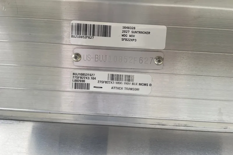 Slide: The Image of Serial number plate on 2027 Sun Tracker Fishin' Barge 22 XP3 boat. - 130