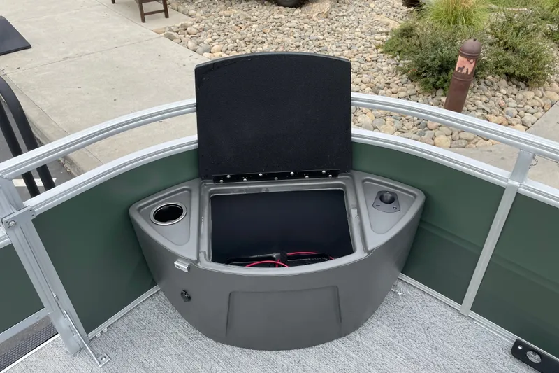 Slide: The Image of Sun Tracker Fishin' Barge 22 XP3, 2027 model, open storage compartment on deck. - 17