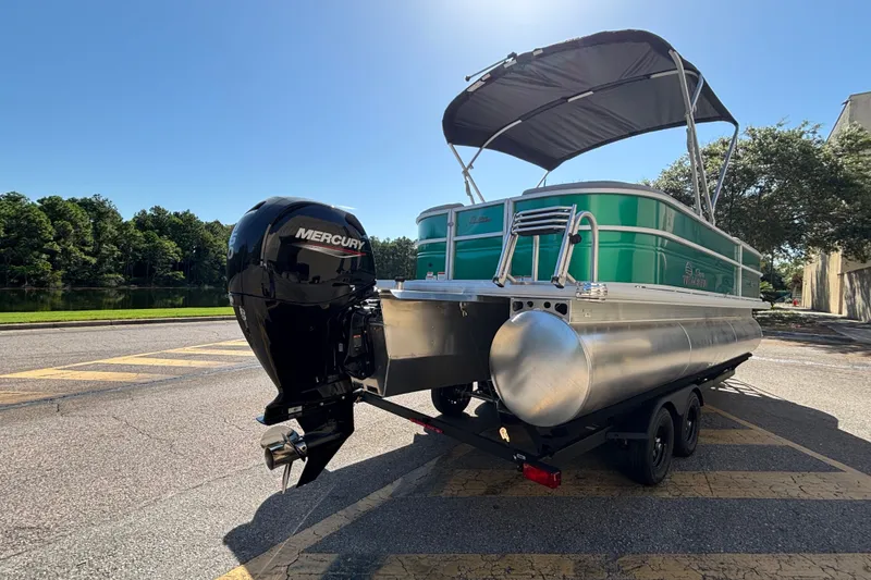 Slide: The Image of 2027 Sun Tracker Party Barge 22 XP3 pontoon boat with Mercury engine on trailer. - 16