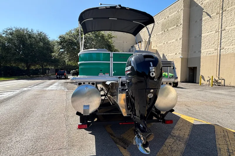 Slide: The Image of 2027 Sun Tracker Party Barge 22 XP3 with Mercury 150 engine on trailer. - 12