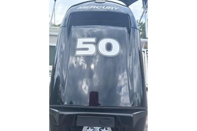 Slide: The Image of Mercury 50 horsepower outboard motor on 2027 Sun Tracker Bass Buggy 16 XL Select. - 13
