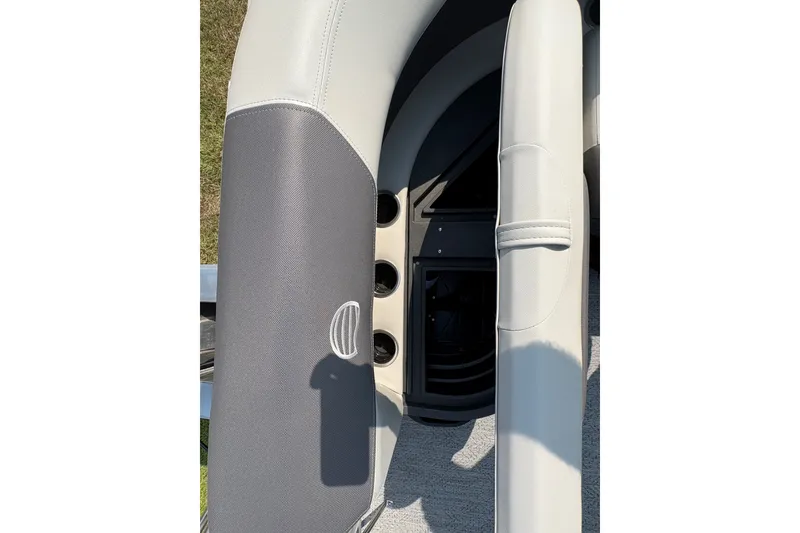 Slide: The Image of 2027 Sun Tracker Bass Buggy 16 XL Select interior seating detail with cup holders. - 72
