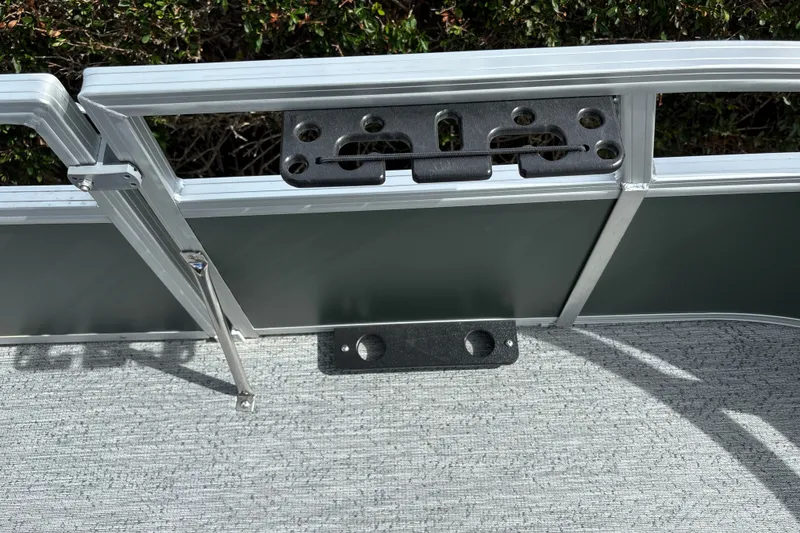 Slide: The Image of 2027 Sun Tracker Bass Buggy 16 XL Select boat deck with railing and mounting bracket. - 23