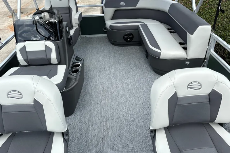 Slide: The Image of Interior of 2027 Sun Tracker Bass Buggy 16 XL Select pontoon boat with gray seating. - 13