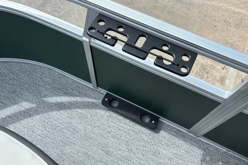 Slide: The Image of Interior view of 2027 Sun Tracker Bass Buggy 16 XL Select boat, featuring seating and railing. - 22