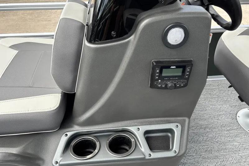 Slide: The Image of Interior of 2027 Sun Tracker Bass Buggy 16 XL Select with console and cup holders. - 17