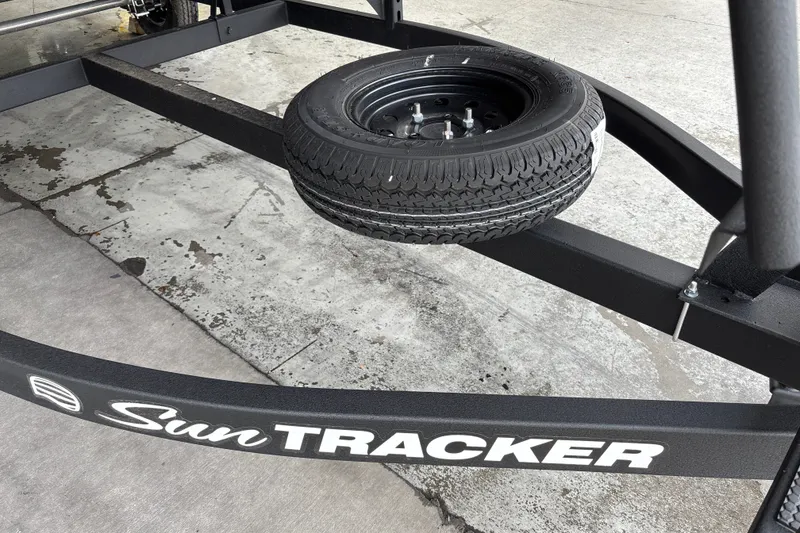 Slide: The Image of Trailer of 2027 Sun Tracker Bass Buggy 16 XL Select with spare tire. - 27
