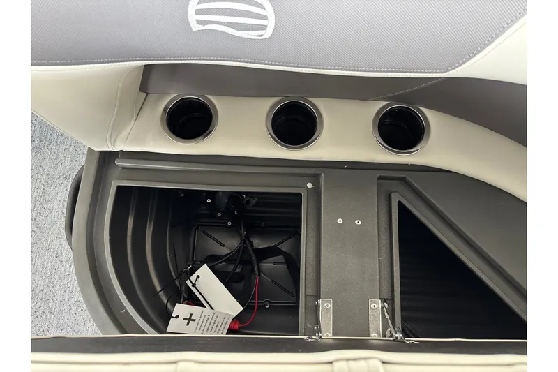 Slide: The Image of Interior view of 2027 Sun Tracker Bass Buggy 16 XL Select with cup holders and storage compartment. - 18