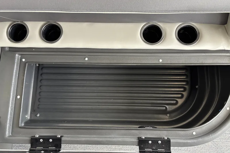Slide: The Image of Interior view of 2027 Sun Tracker Bass Buggy 16 XL Select with cup holders and storage compartment. - 19