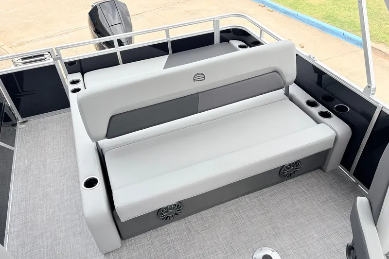Slide: The Image of 2027 Sun Tracker Party Barge 22 RF XP3 interior with cushioned seating and cup holders. - 37