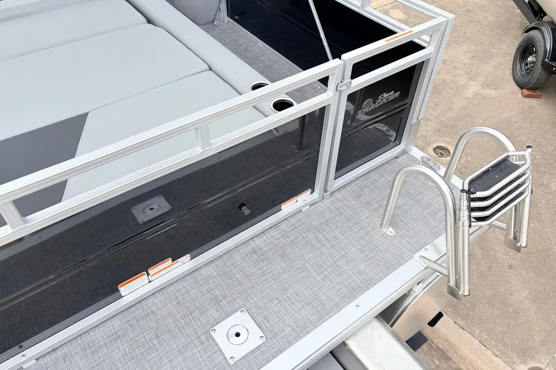Slide: The Image of 2027 Sun Tracker Party Barge 22 RF XP3 pontoon boat with ladder and seating area. - 51