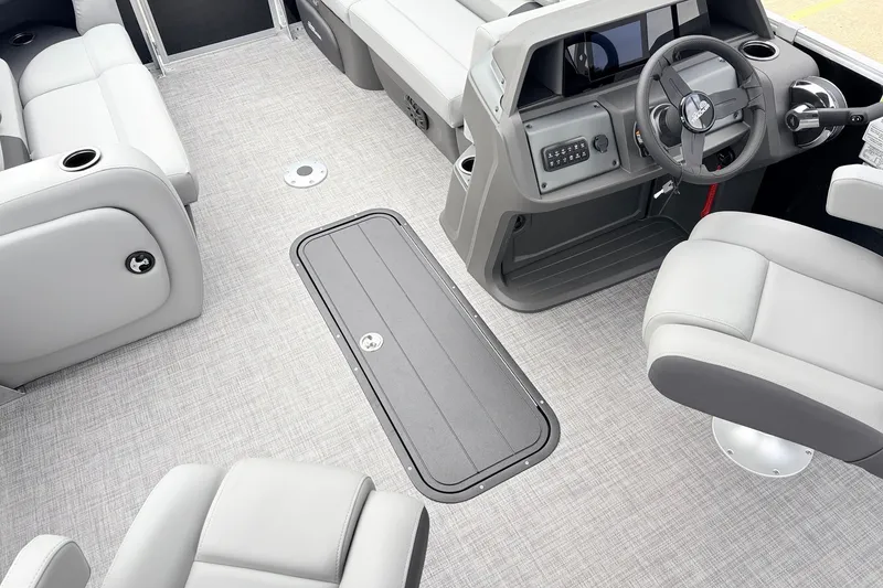 Slide: The Image of Interior of 2027 Sun Tracker Party Barge 22 RF XP3 with modern seating and helm. - 23