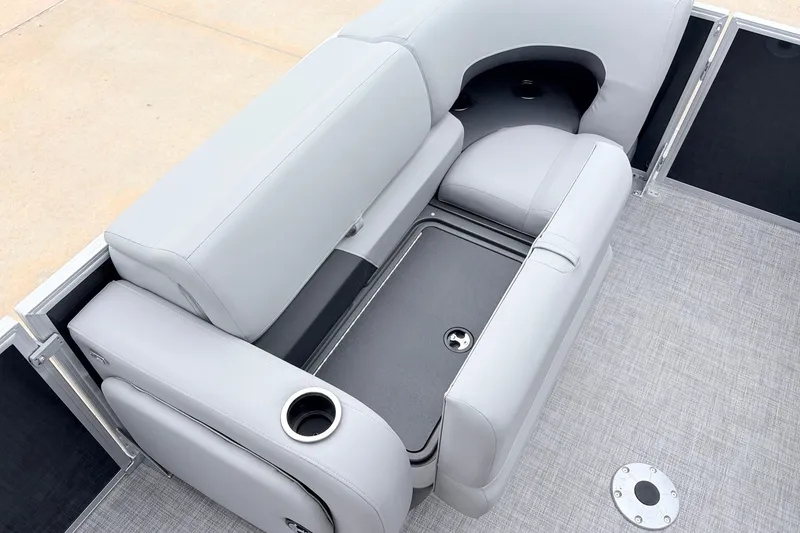 Slide: The Image of 2027 Sun Tracker Party Barge 22 RF XP3 interior seating with storage and cup holder. - 14