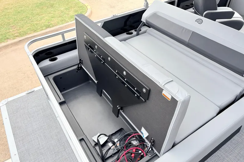 Slide: The Image of 2027 Sun Tracker Party Barge 22 RF XP3 with open storage compartment and seating area. - 47