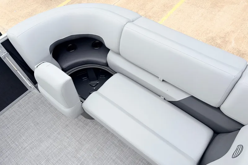 Slide: The Image of 2027 Sun Tracker Party Barge 22 RF XP3 interior seating with cup holders, gray upholstery. - 21