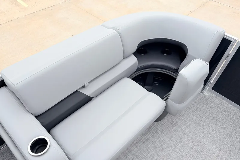 Slide: The Image of 2027 Sun Tracker Party Barge 22 RF XP3 seating area with cup holders and gray upholstery. - 16