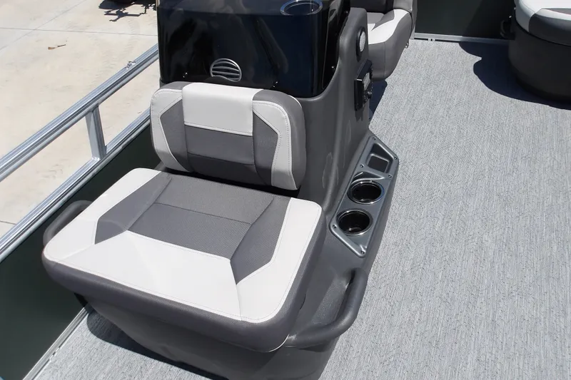 Slide: The Image of 2027 Sun Tracker Bass Buggy 16 XL Select boat seat with cup holders and gray upholstery. - 14