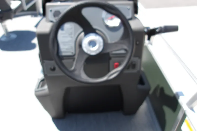 Slide: The Image of Steering console of 2027 Sun Tracker Bass Buggy 16 XL Select pontoon boat. - 18