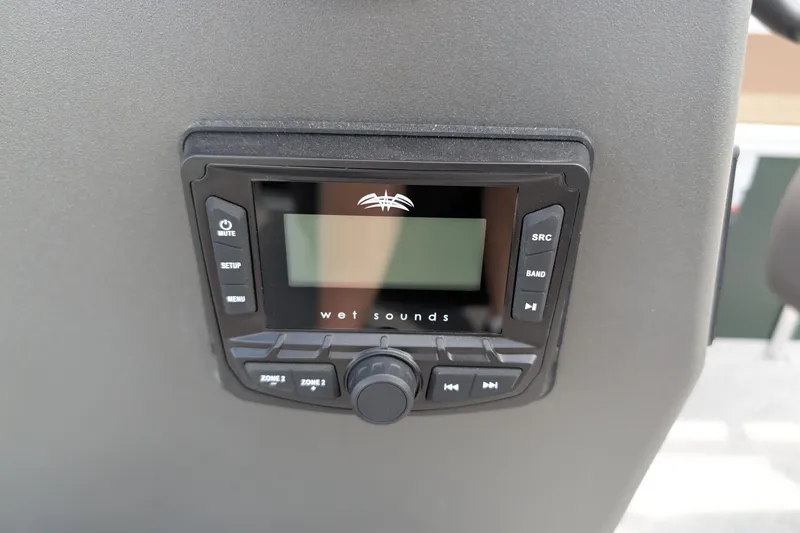Slide: The Image of Wet Sounds audio system on 2027 Sun Tracker Bass Buggy 18 DLX boat dashboard. - 14