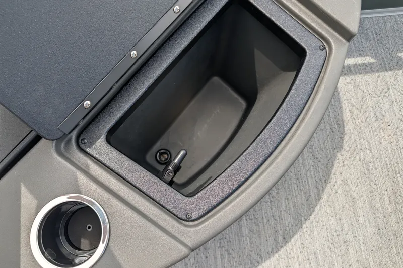 Slide: The Image of Storage compartment and cup holder on 2027 Sun Tracker Bass Buggy 18 DLX boat. - 15