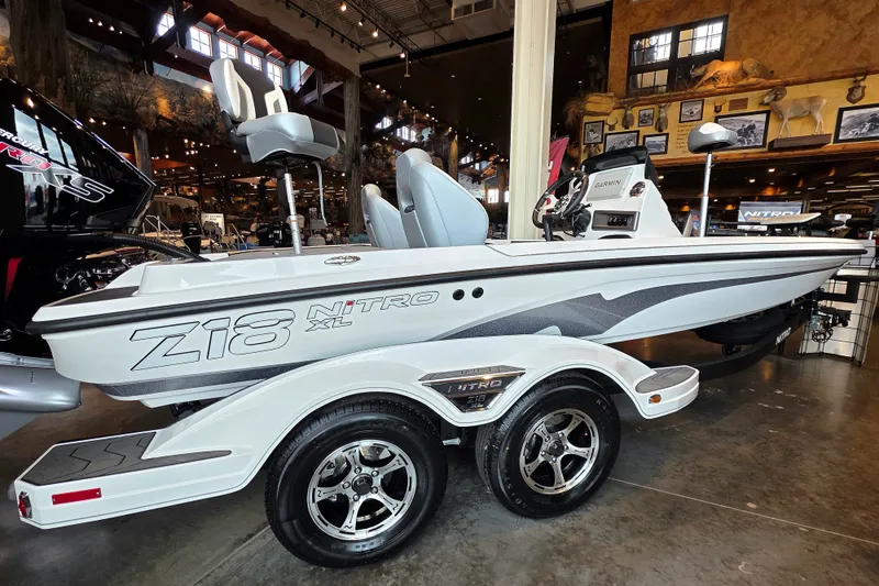 The Image of 2027 Nitro Z18 XL Pro boat displayed indoors on a trailer. - 0