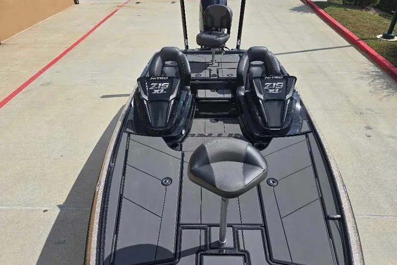 Slide: The Image of 2026 Nitro Z19 XL Pro boat with dual seats and sleek design on a concrete surface. - 13