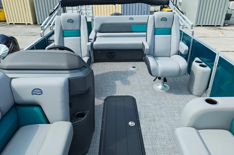 Slide: The Image of 2027 Sun Tracker Party Barge 22 RF XP3 interior with gray seating and modern design. - 14