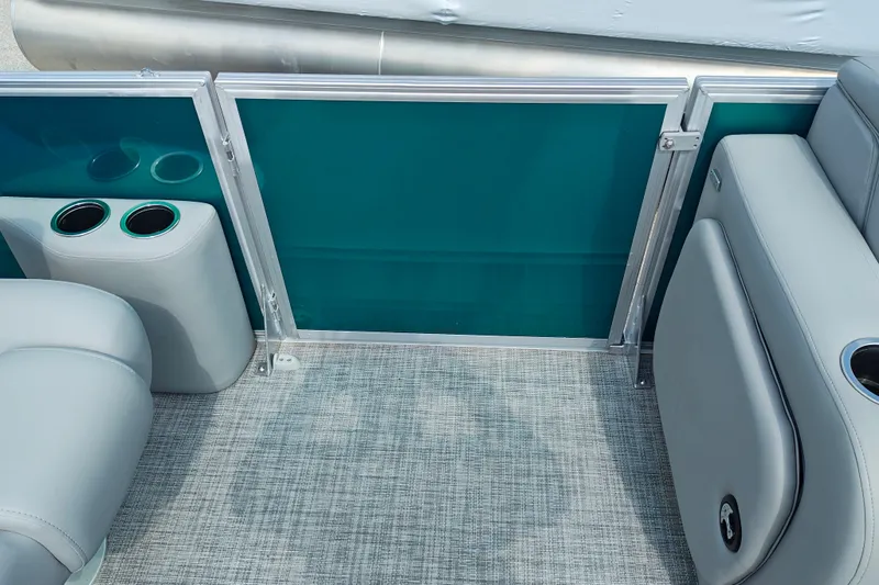 Slide: The Image of Interior of 2027 Sun Tracker Party Barge 22 RF XP3 with cup holders and seating. - 16