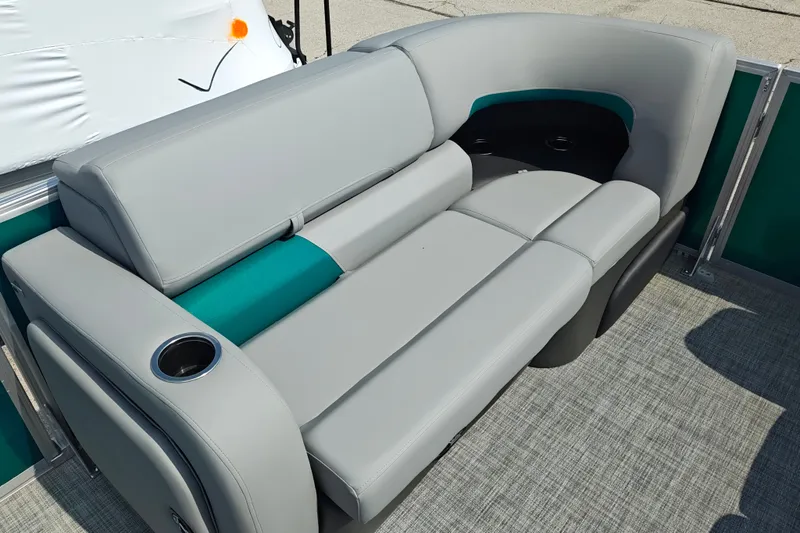 Slide: The Image of 2027 Sun Tracker Party Barge 22 RF XP3, featuring sleek gray seating with cup holders. - 37