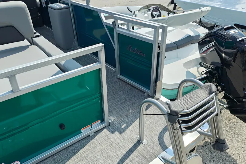 Slide: The Image of 2027 Sun Tracker Party Barge 22 RF XP3 with Mercury engine and seating area. - 29