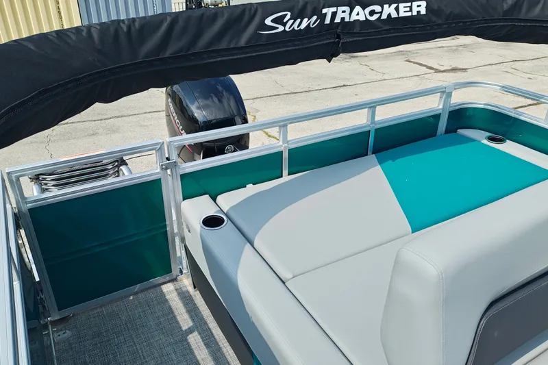 Slide: The Image of 2027 Sun Tracker Party Barge 22 RF XP3 with seating and outboard motor. - 26