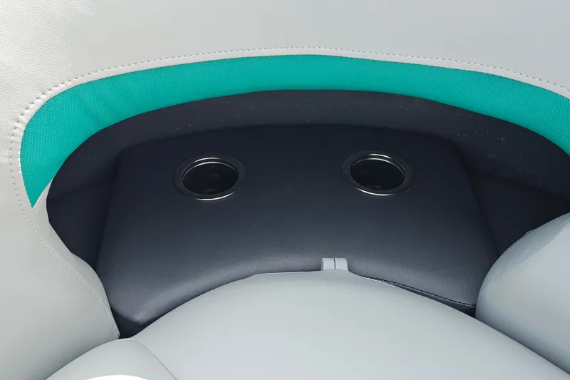 Slide: The Image of Cup holders on Sun Tracker Party Barge 22 RF XP3, 2027 model, with teal and gray seating. - 36