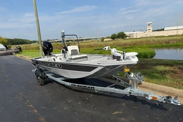 The Image of 2027 Tracker Bass Tracker Classic CC boat on trailer near waterway. - 0