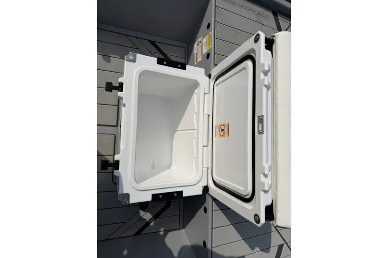 Slide: The Image of Open storage compartment on 2027 Tracker Bass Tracker Classic CC boat. - 14
