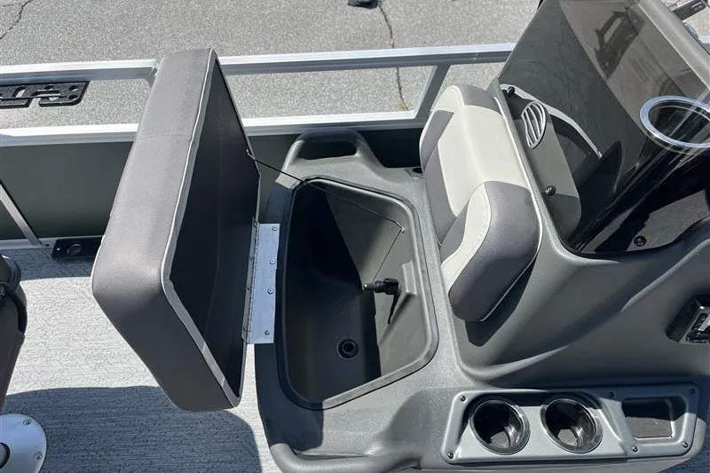 Slide: The Image of 2027 Sun Tracker Bass Buggy 16 XL Select boat interior with open storage compartment. - 14
