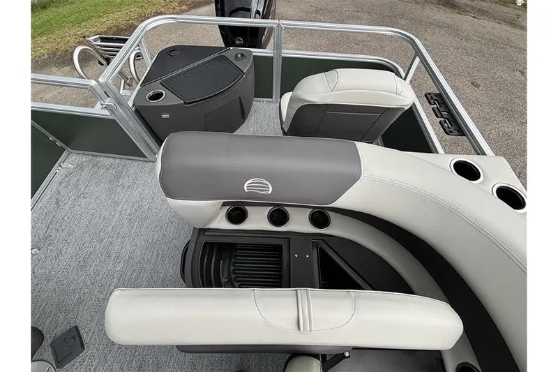 Slide: The Image of 2027 Sun Tracker Bass Buggy 18 DLX interior with seating and cup holders. - 22