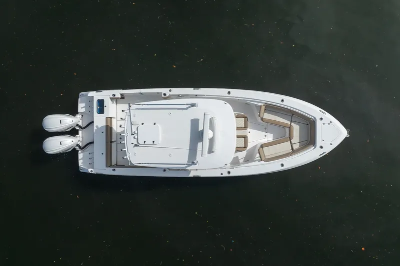 Slide: The Image of Overhead view of 2020 Everglades 355 Center Console boat on water. - 6