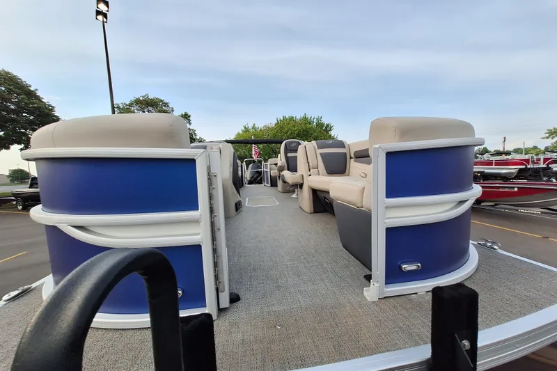 The Image of 2023 Barletta Cabrio 22QC pontoon boat with beige seating and blue exterior. - 0