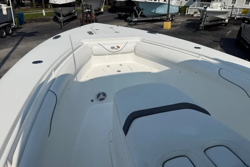 Slide: The Image of 2015 Sea Hunt Gamefish 30CB boat interior with spacious seating and sleek design. - 3
